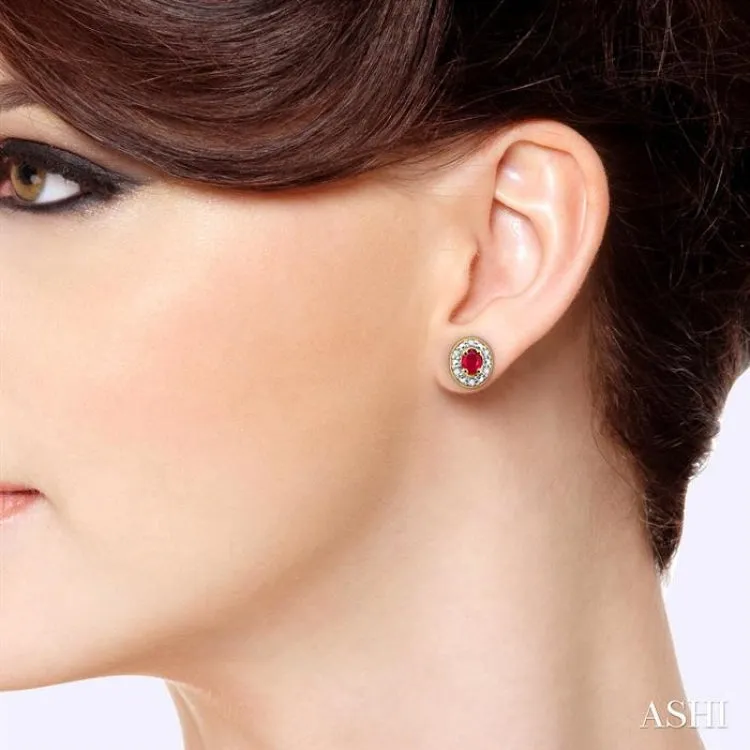 4x3 MM Oval Shaped Ruby and 1/10 ctw Single Cut Diamond Earrings in 14K Yellow Gold