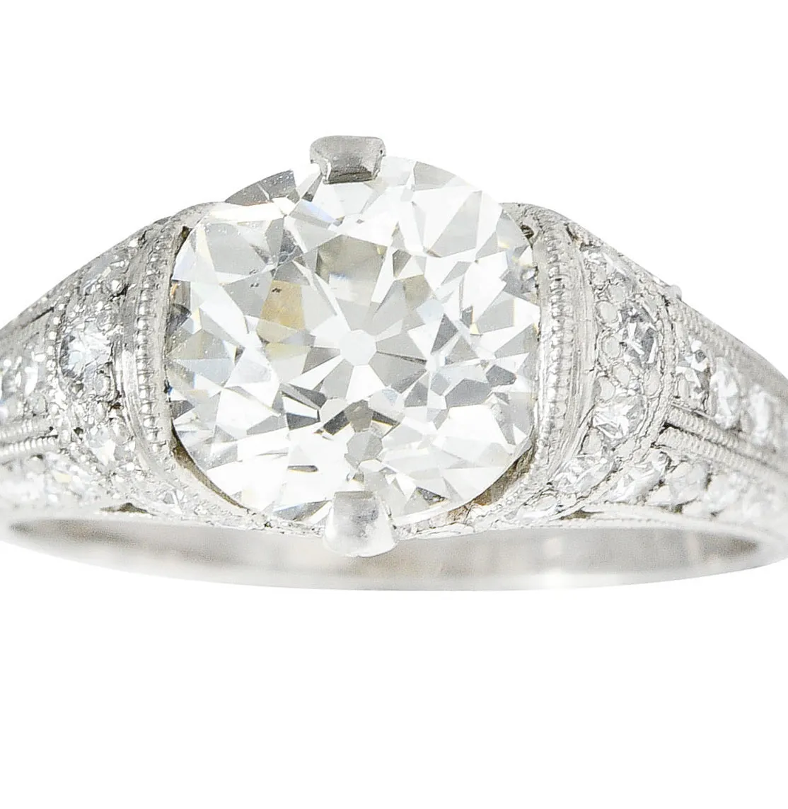 Edwardian 3.00 CTW Old Mine Cut Diamond Platinum Scrolled Feather Antique Engagement Ring