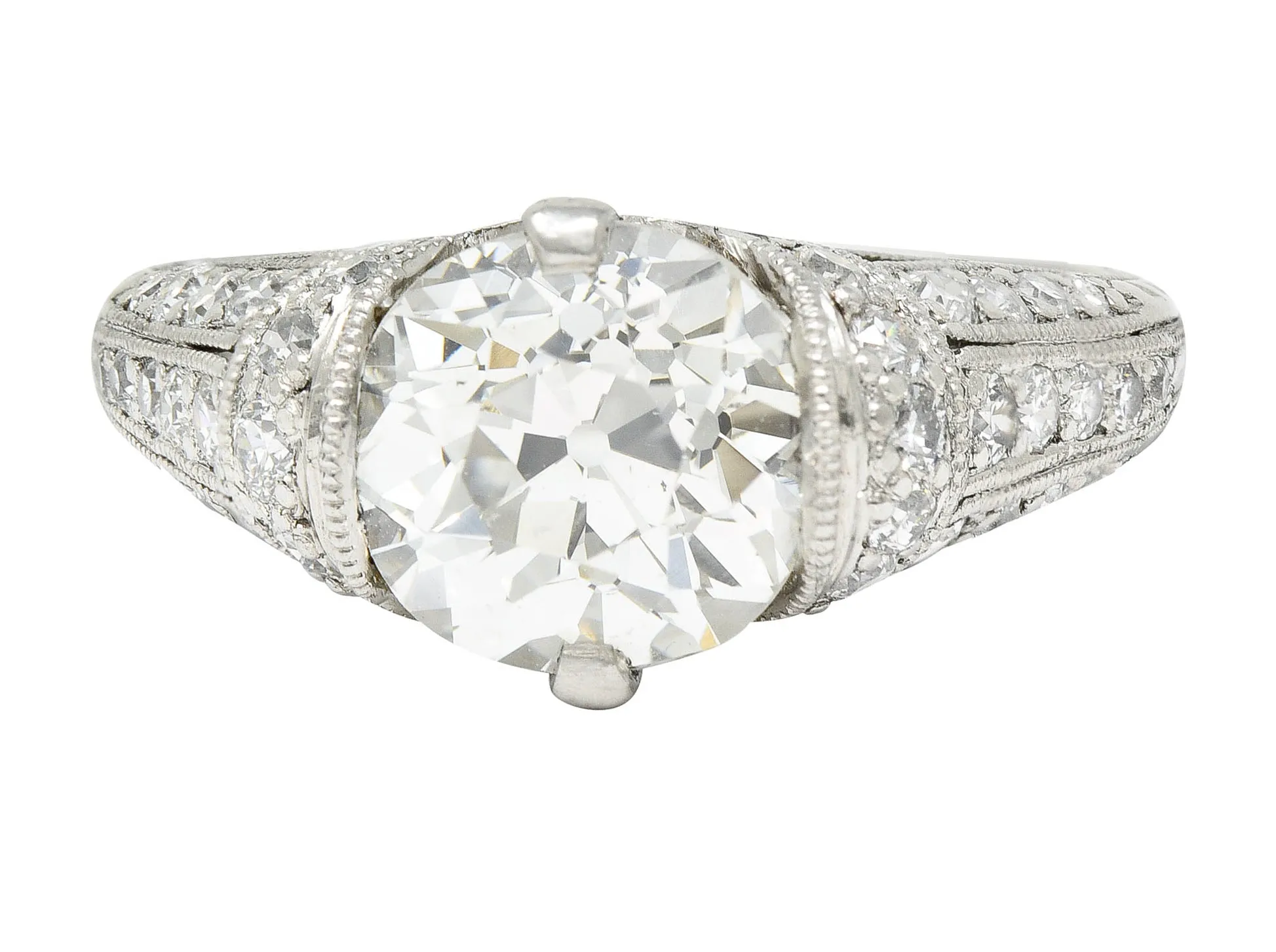 Edwardian 3.00 CTW Old Mine Cut Diamond Platinum Scrolled Feather Antique Engagement Ring