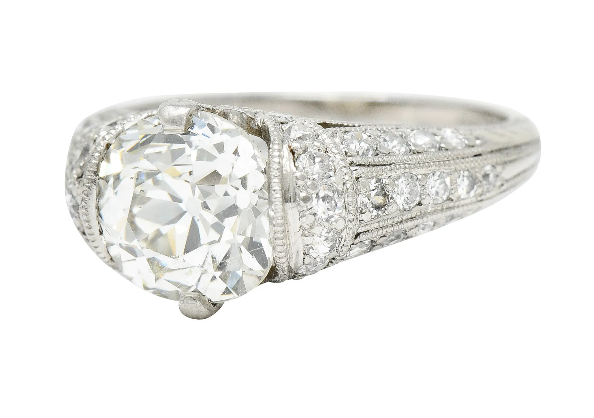 Edwardian 3.00 CTW Old Mine Cut Diamond Platinum Scrolled Feather Antique Engagement Ring