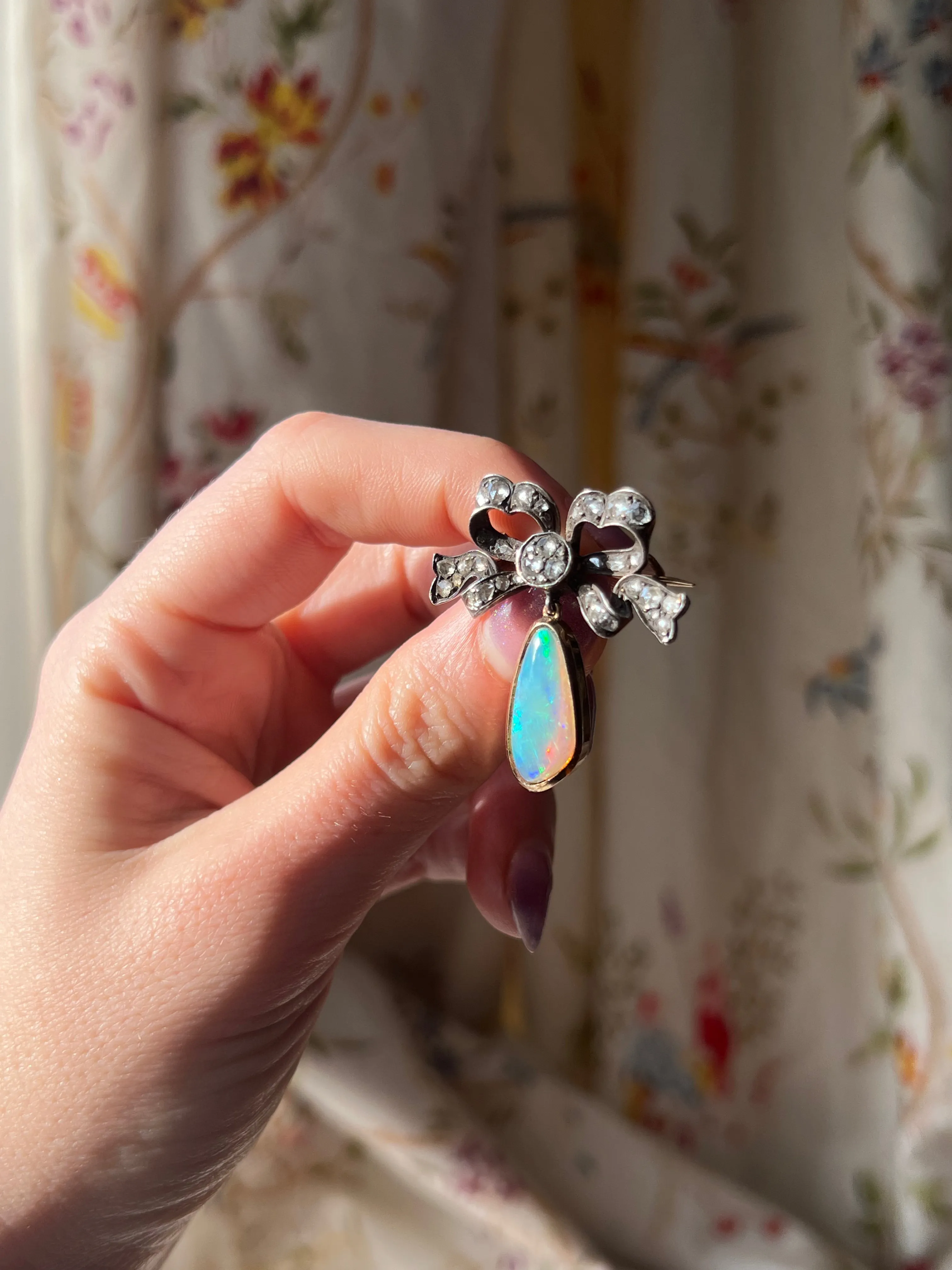 Exceptional Late 19th C and Diamond Bow and Opal Pendant