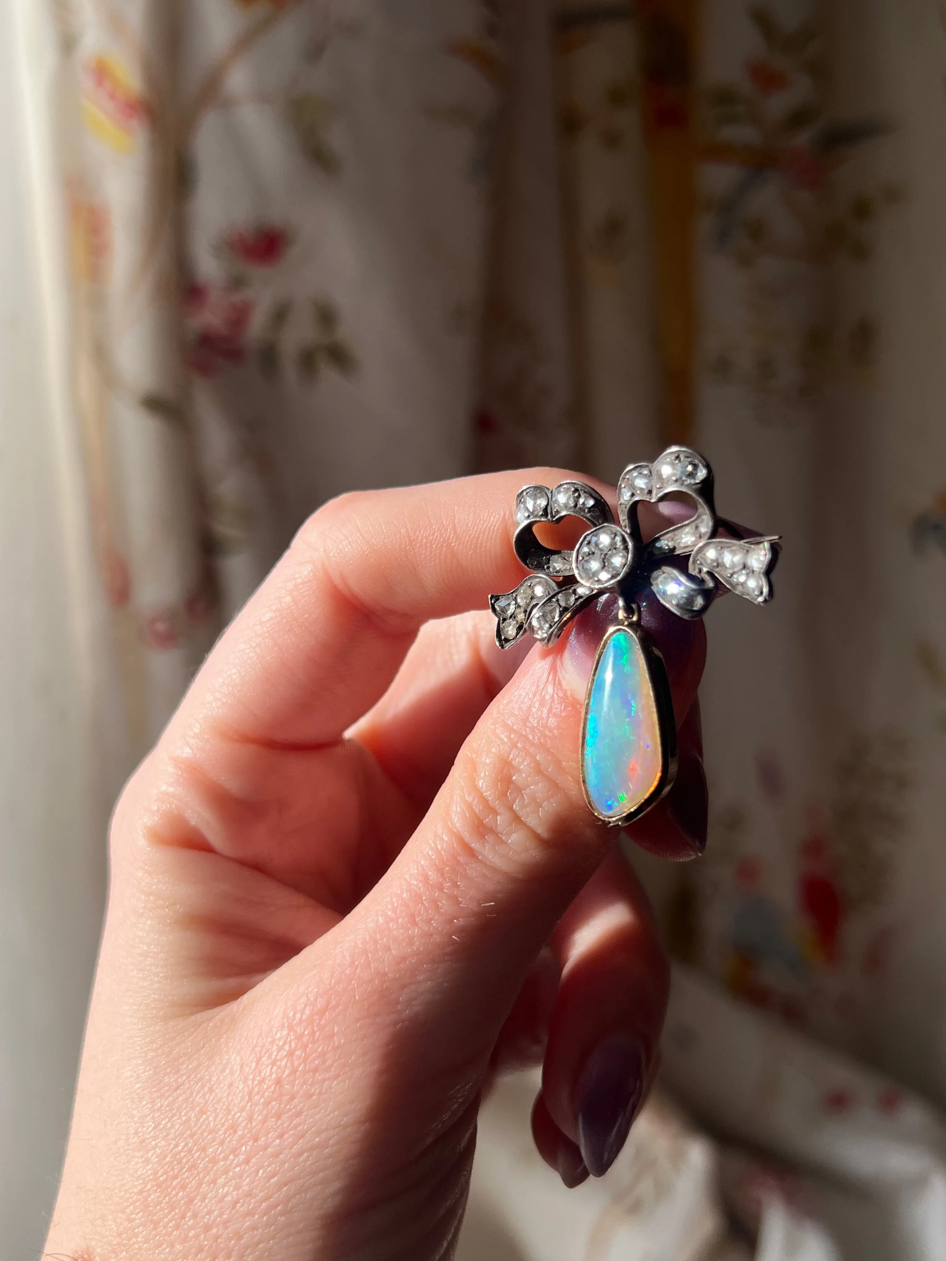 Exceptional Late 19th C and Diamond Bow and Opal Pendant