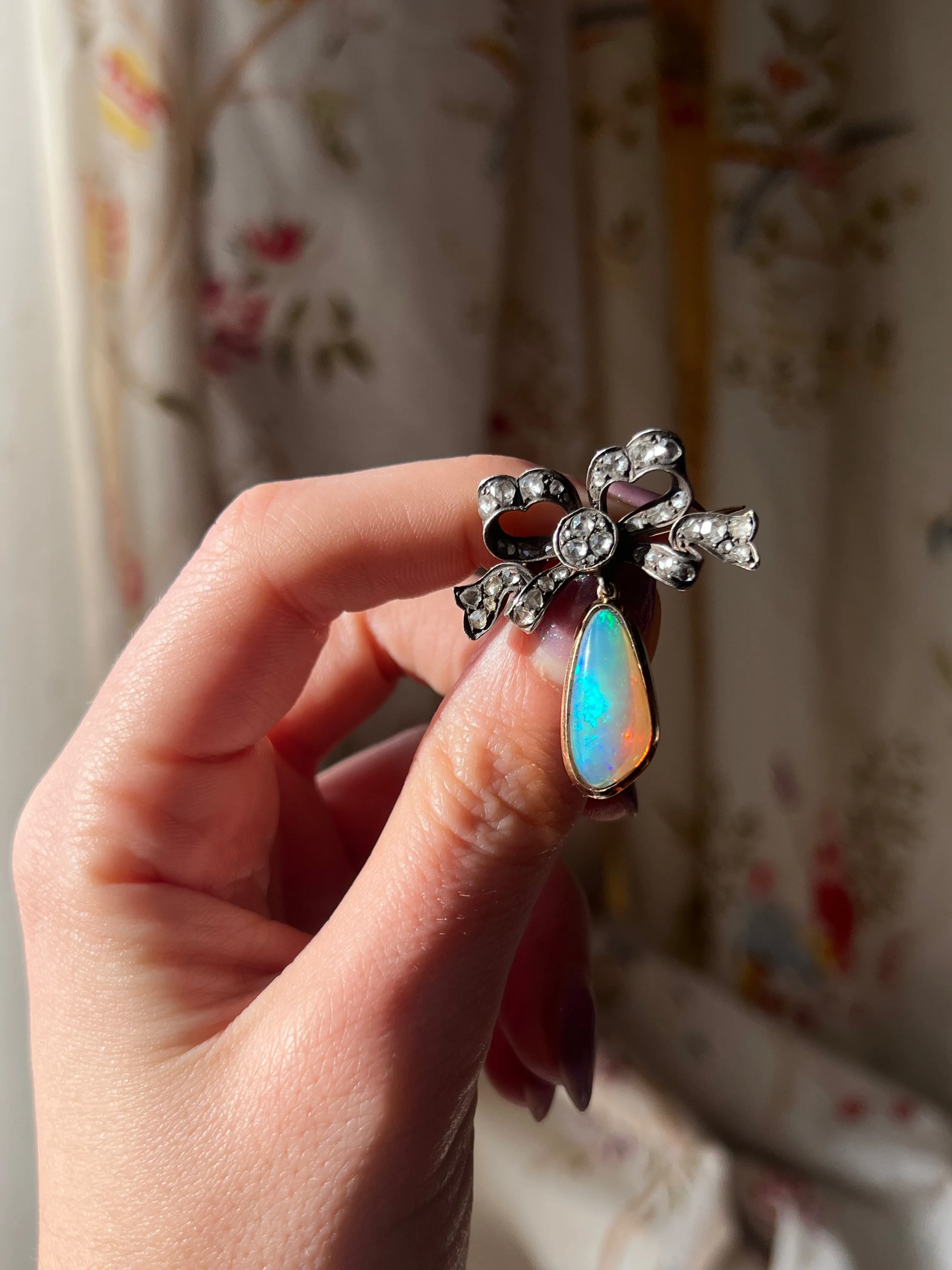 Exceptional Late 19th C and Diamond Bow and Opal Pendant