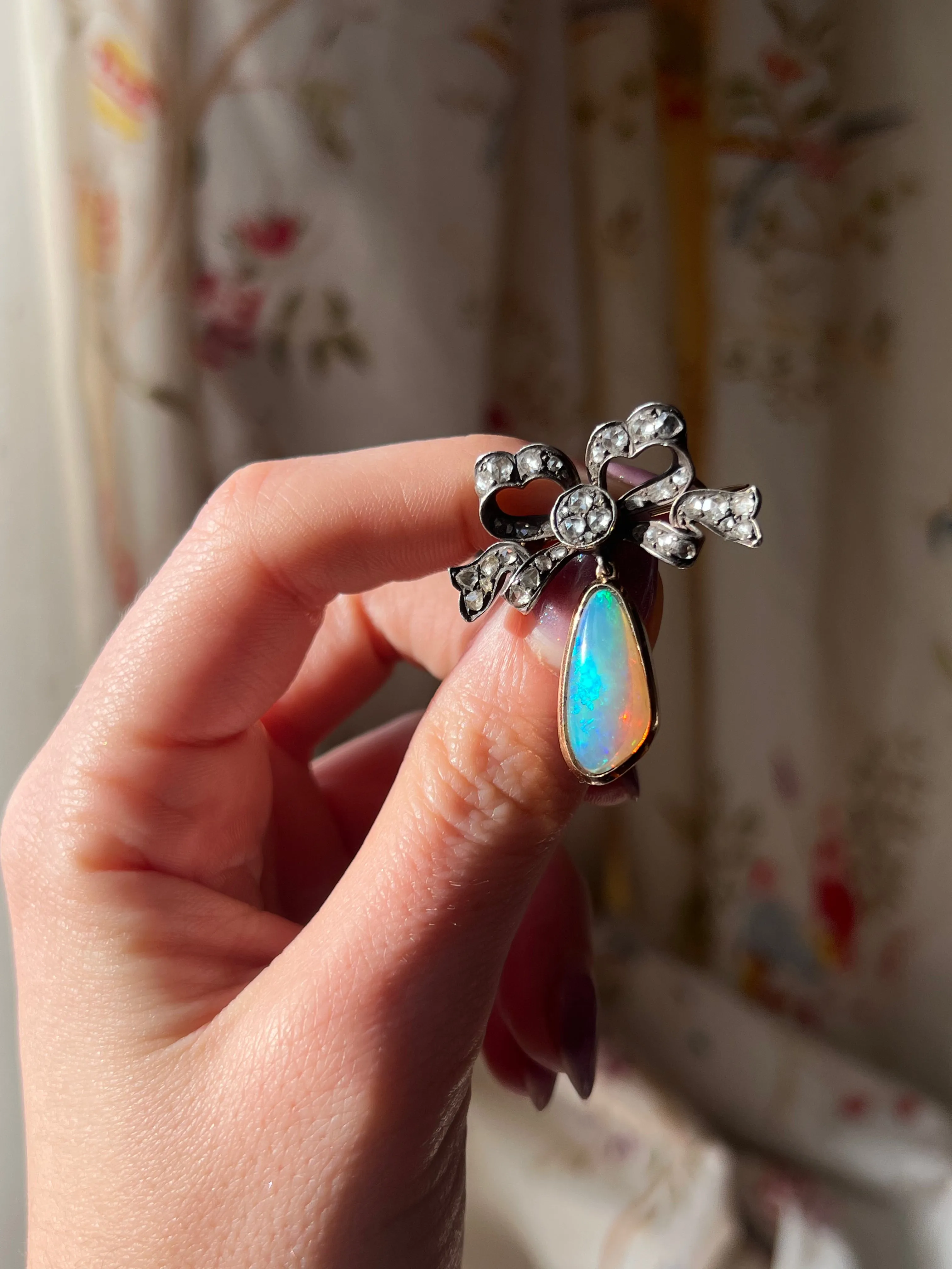 Exceptional Late 19th C and Diamond Bow and Opal Pendant