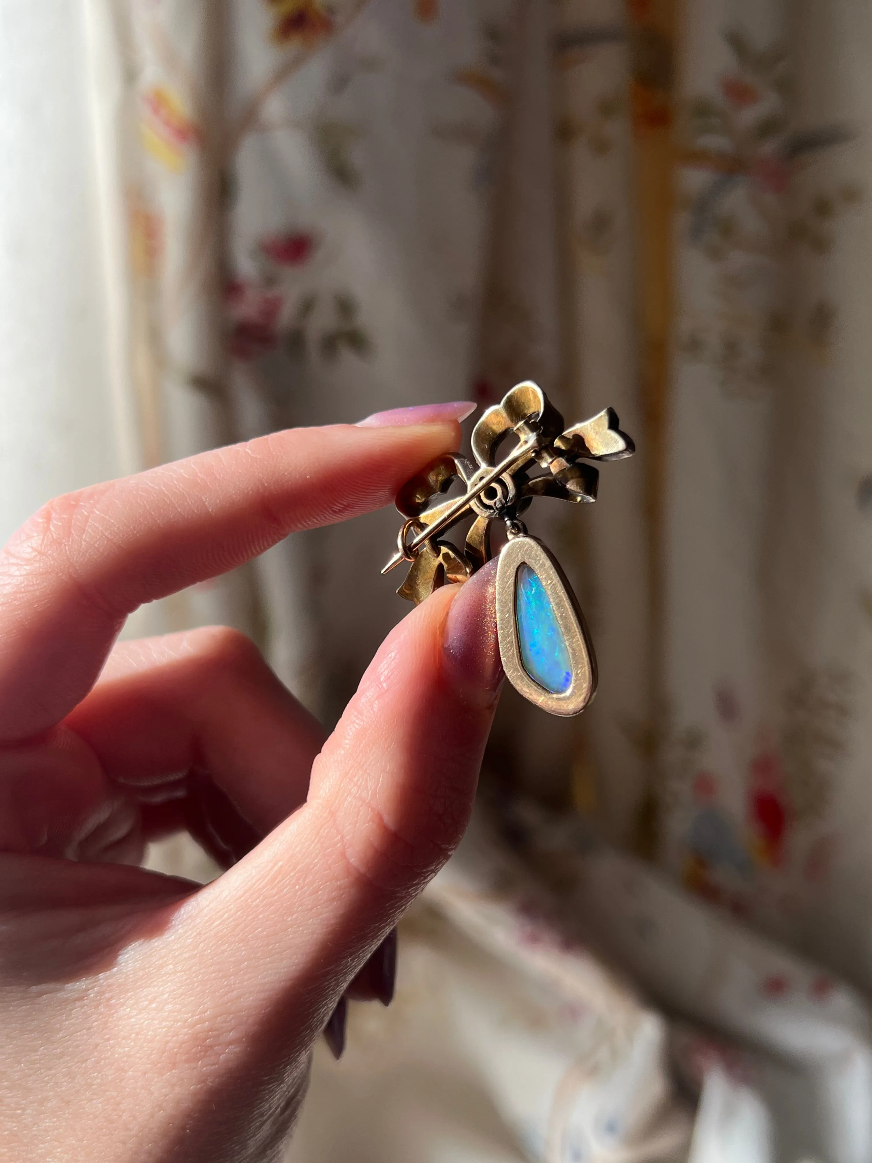 Exceptional Late 19th C and Diamond Bow and Opal Pendant