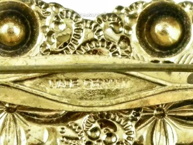 German Repousse Goldtone Brooch Variegated Blue Art Glass