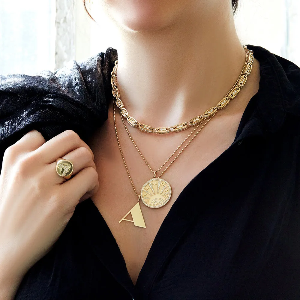 Gold & Diamond Luck Coin with Rays Charm