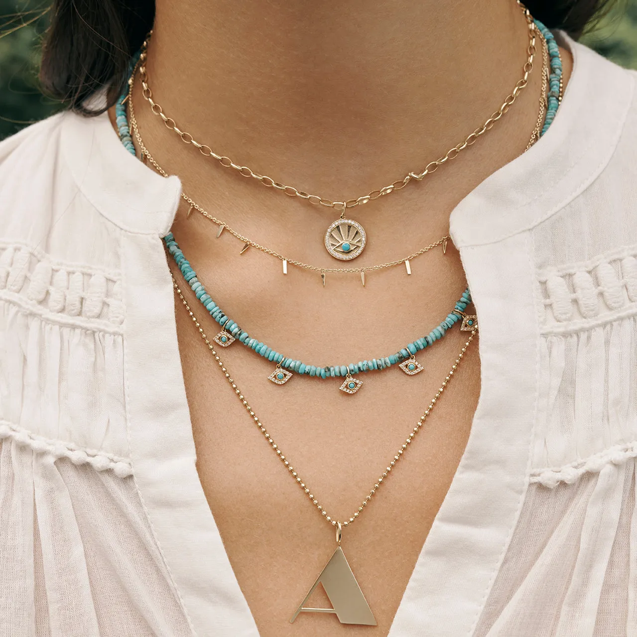 Gold Diamond & Turquoise Eye with Rays Coin Charm