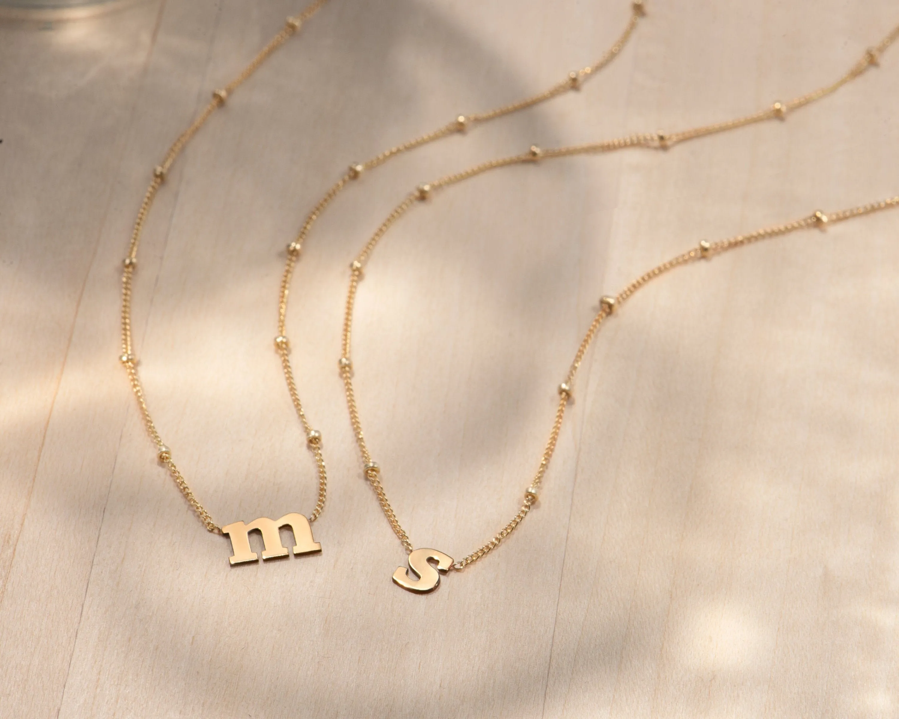 Lowercase Initial Gold