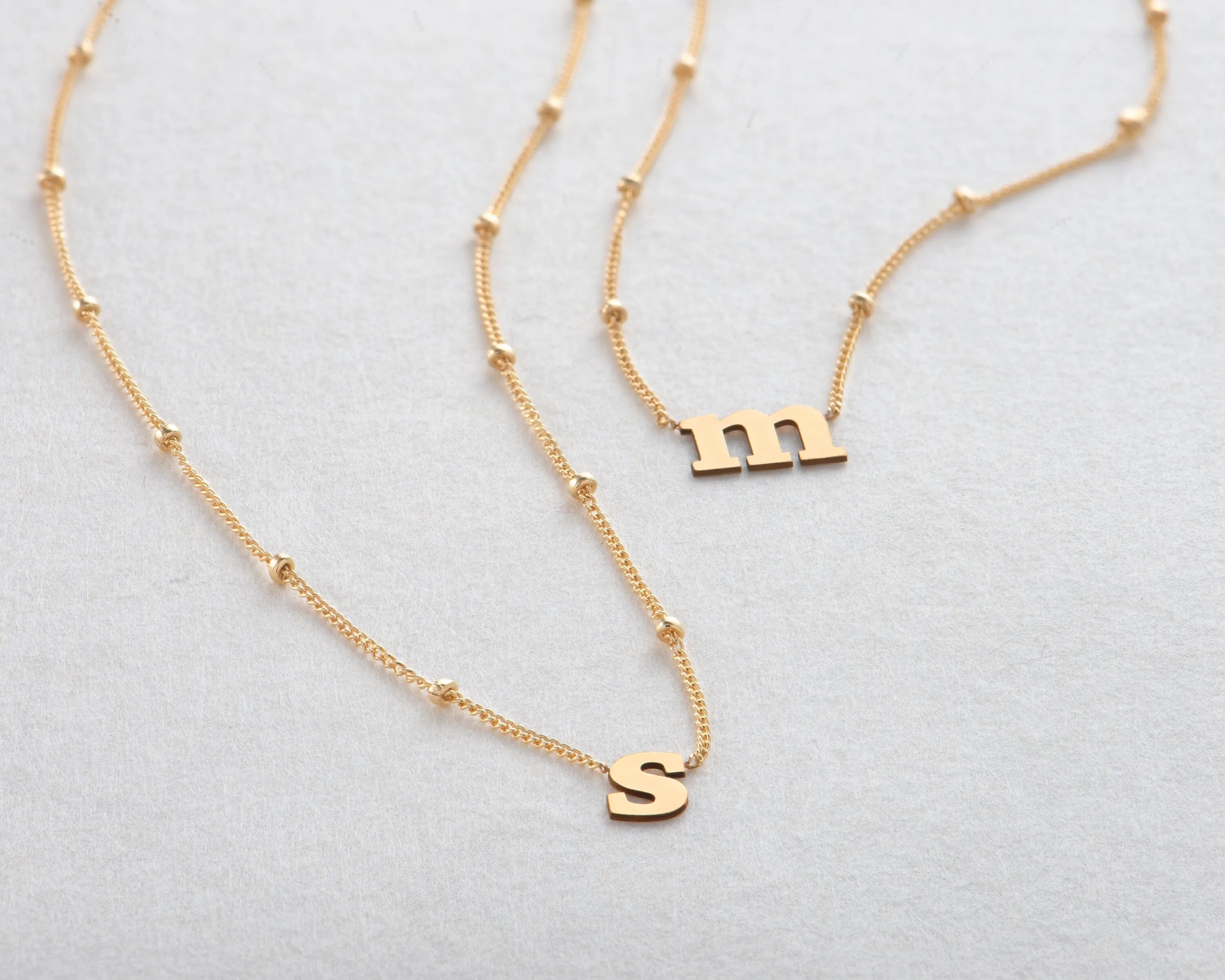 Lowercase Initial Gold