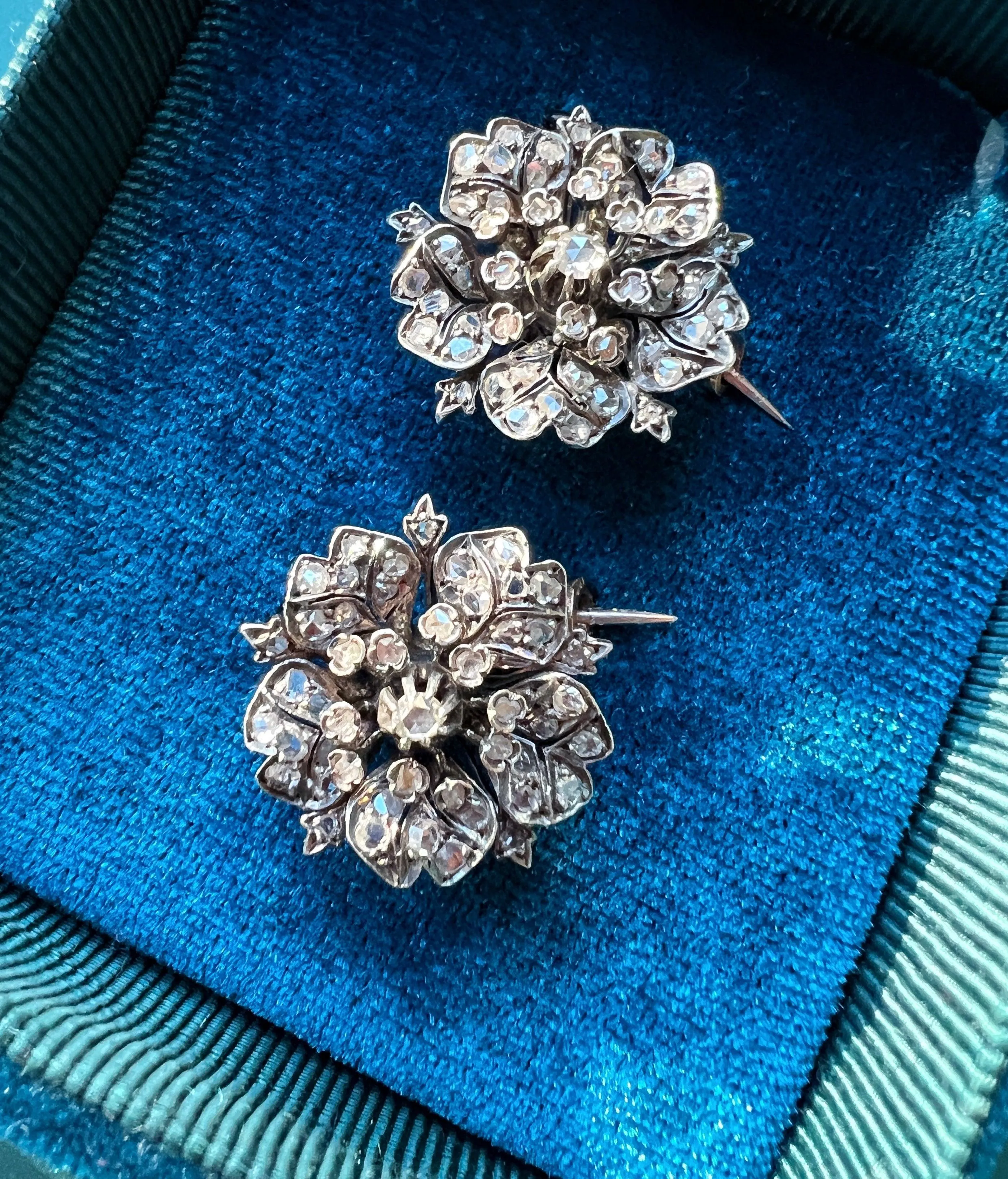 Pair of Victorian era 18K gold double diamond flower brooches