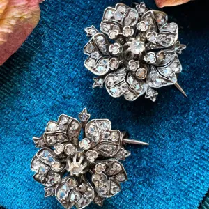 Pair of Victorian era 18K gold double diamond flower brooches
