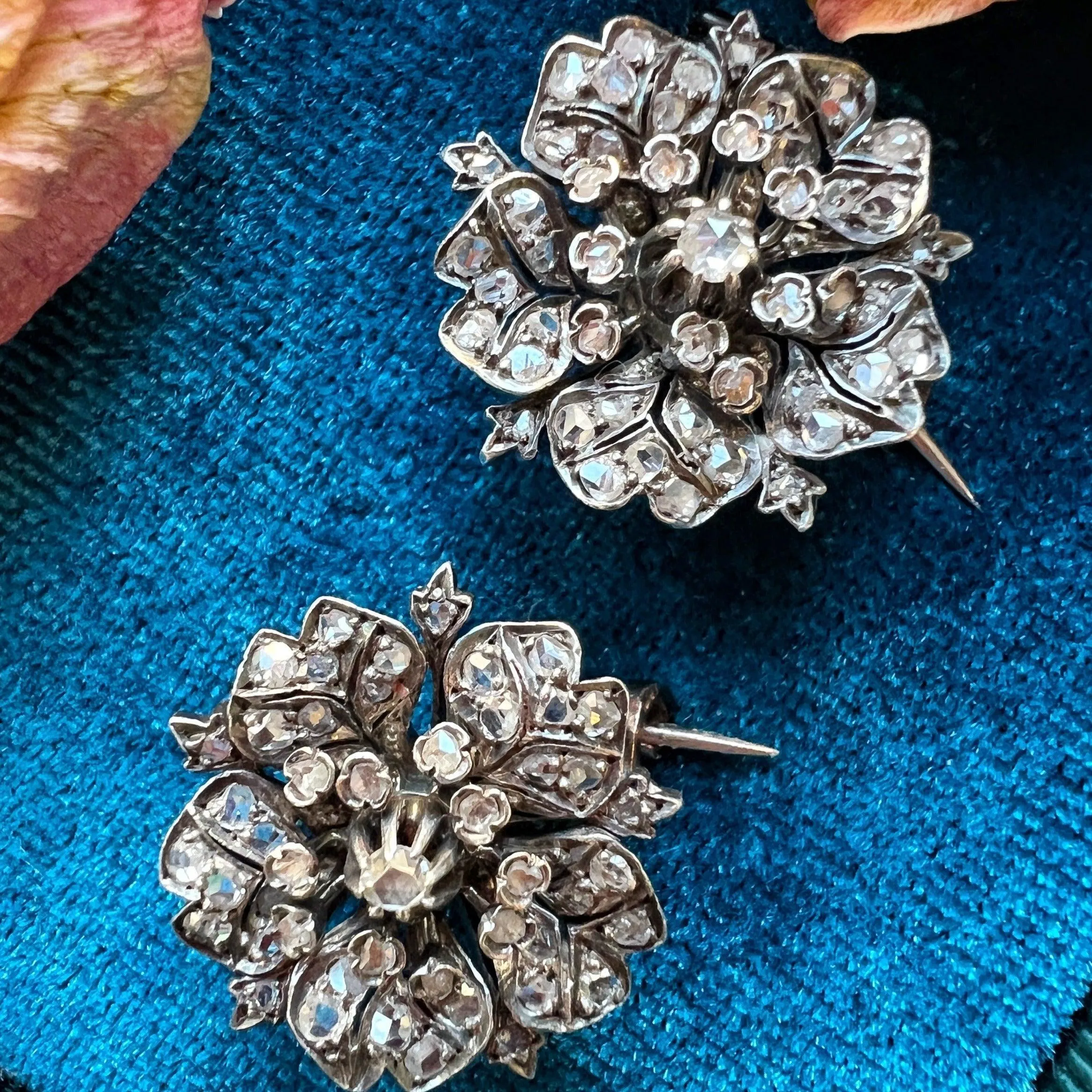 Pair of Victorian era 18K gold double diamond flower brooches