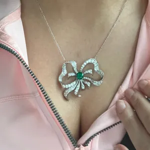 Platinum Bow with Emerald and Diamonds