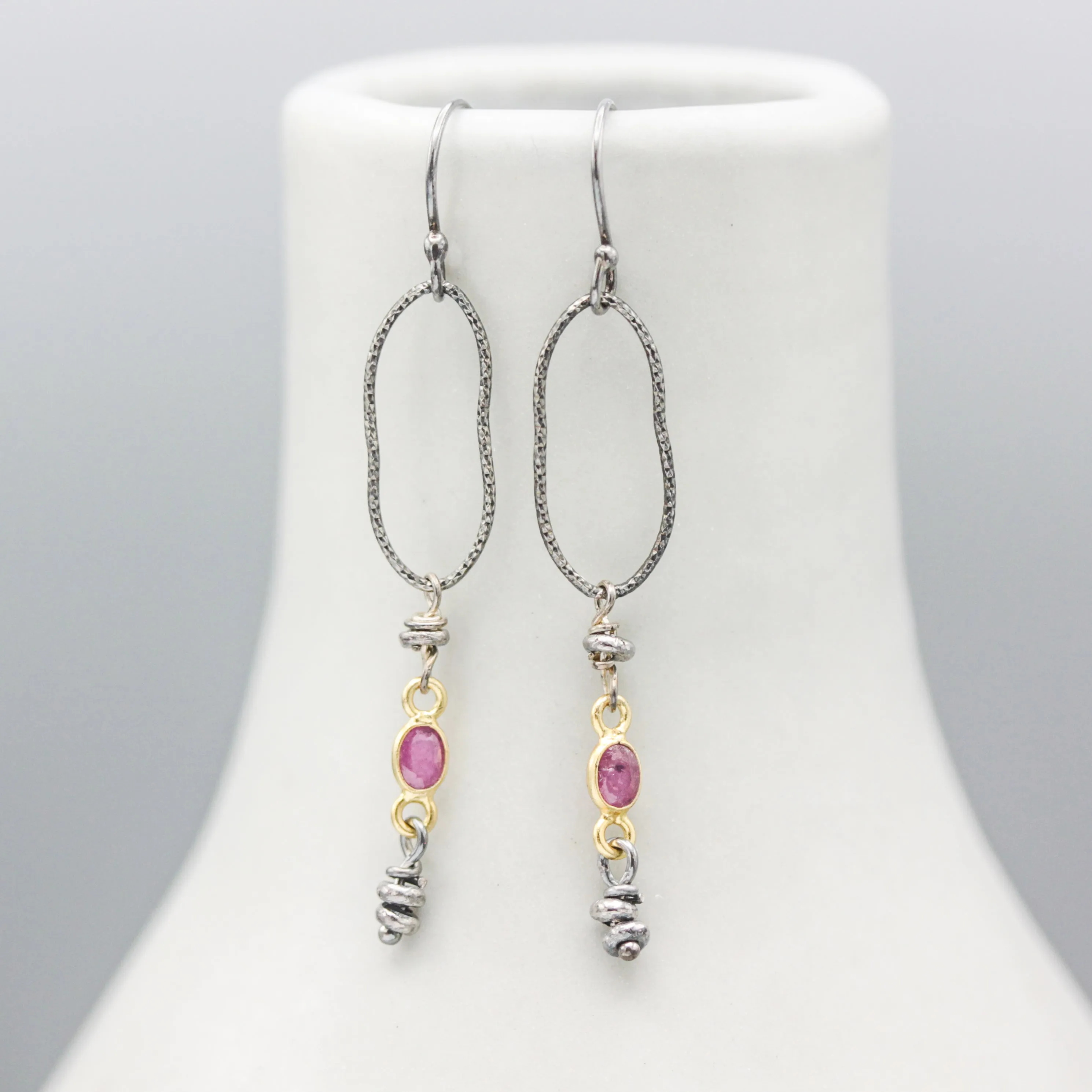Siamese Ruby Earrings with silver beads and silver peanut shape on hooks style design