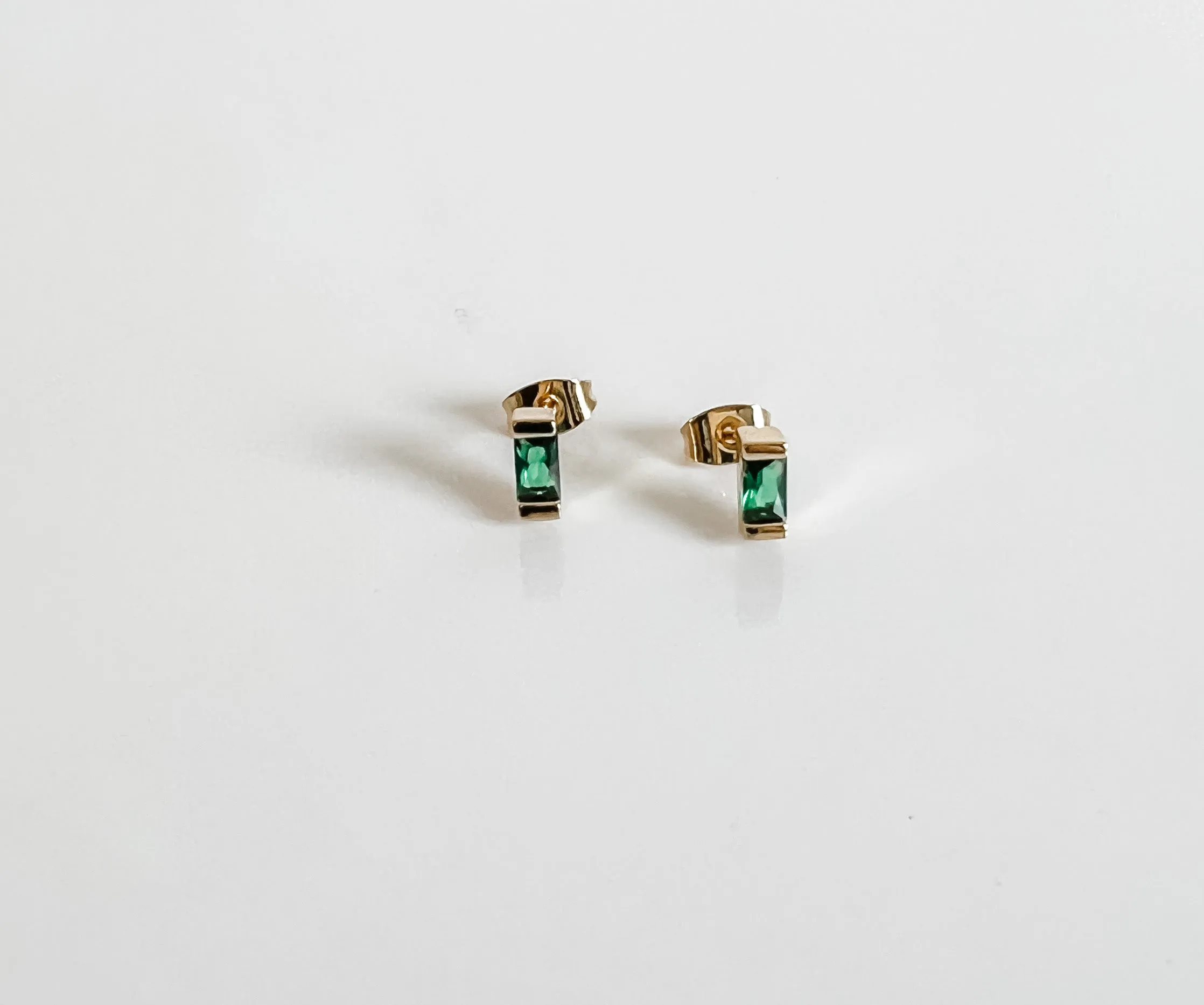 TINY EMERALD STUDS