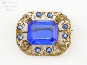 Vintage Czech Goldtone Filigree Brooch with Sapphire Blue Stones