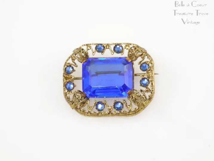Vintage Czech Goldtone Filigree Brooch with Sapphire Blue Stones