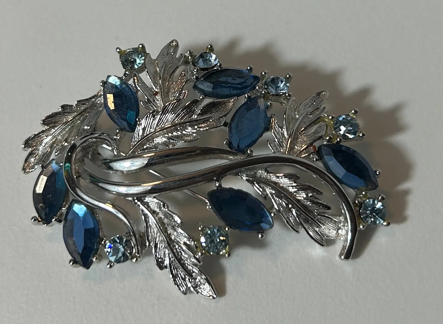 Vintage Silver Tone Leaf and Sapphire Blue Rhinestone Brooch Pin